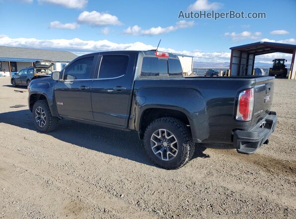1GTG6CEN4J1201608 2018 GMC CANYON Charcoal Trasero izquierdo
