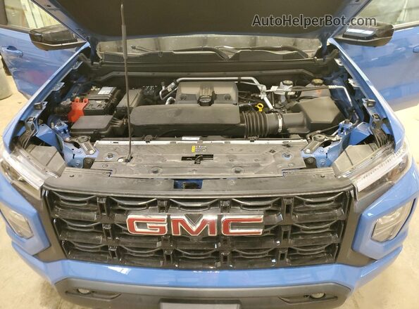 1GTP2BEK6S1192293 2025 GMC CANYON Blue Widok wnętrza z tyłu