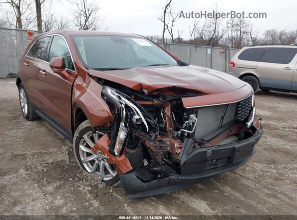 1GYAZAR43MF080039 2021 CADILLAC XT4 Orange Widok z przodu