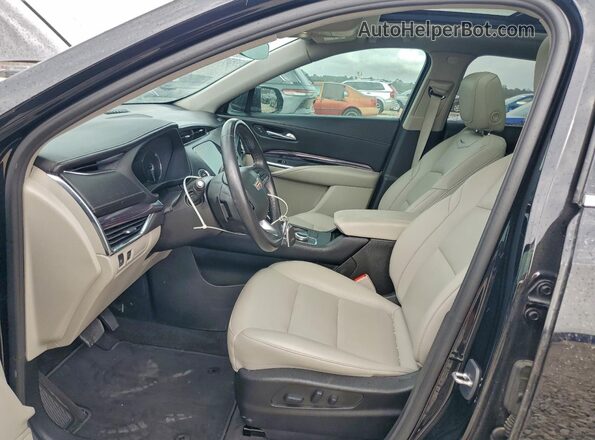 1GYAZAR4XPF103336 2023 CADILLAC XT4 Black Front interior view