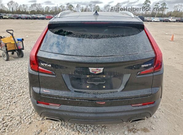 1GYAZAR4XPF103336 2023 CADILLAC XT4 Black Rear view