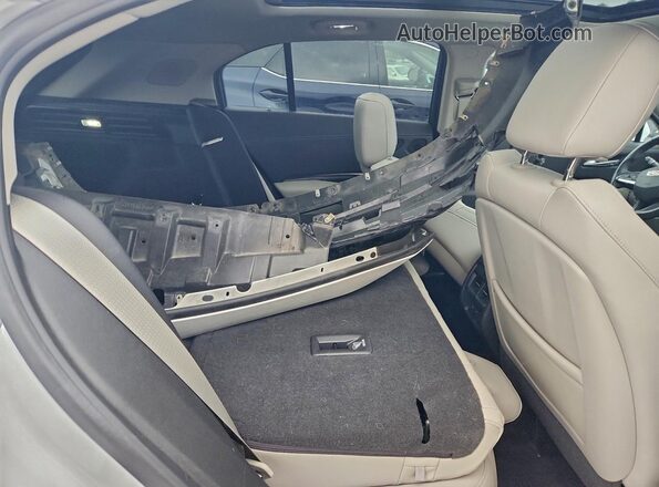 1GYFZBR46MF014631 2021 CADILLAC XT4 White Սալոնի հետևի տեսք