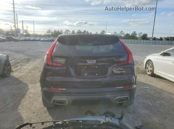 1GYFZCR43MF080088 2021 CADILLAC XT4 Burgundy უკანა ხედი