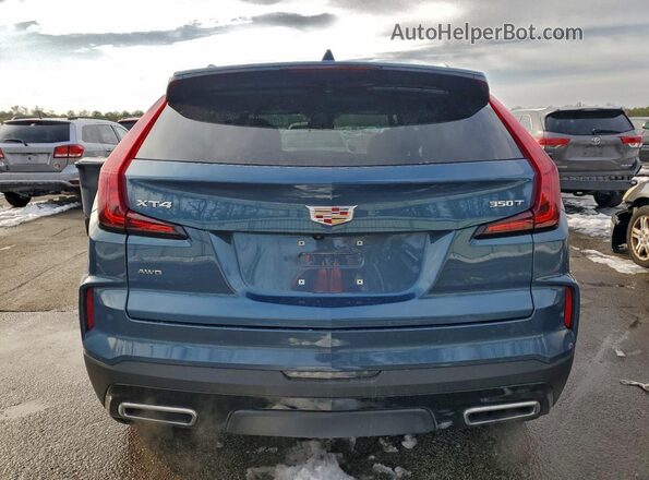 1GYFZDR46RF246620 2024 CADILLAC XT4 Blue Widok z tyłu