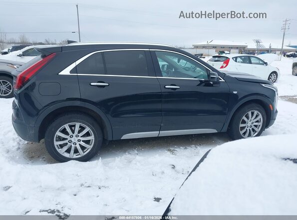 1GYFZDR48NF127705 2022 CADILLAC XT4 Black Widok wnętrza z tyłu