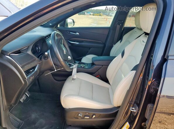 1GYFZER45PF105055 2023 CADILLAC XT4 Black Սալոնի դիմացի տեսք