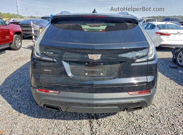 1GYFZFR40KF176128 2019 CADILLAC XT4 Черный Вид сзади