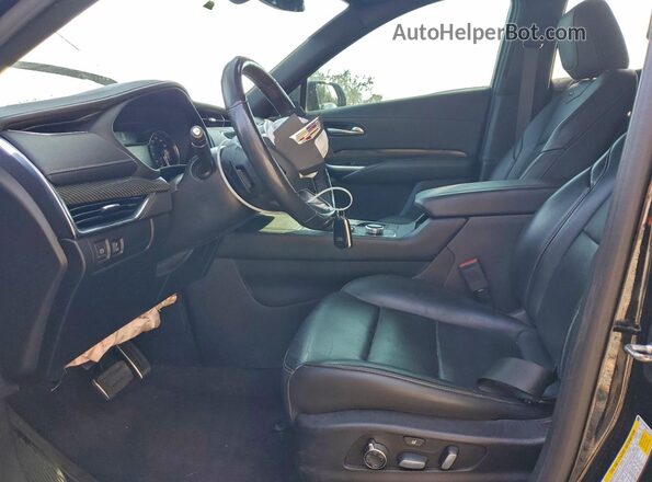 1GYFZFR40KF176128 2019 CADILLAC XT4 Черный Вид салона спереди