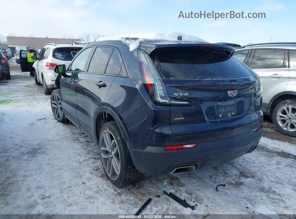 1GYFZFR46NF169236 2022 CADILLAC XT4 Navy Trasero izquierdo