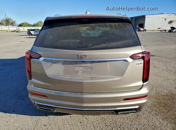 1GYKPCRS3NZ140177 2022 CADILLAC OTHER Tan Вид ззаду