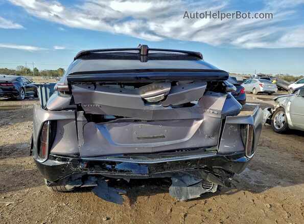 1GYKPMRK0RZ130556 2024 CADILLAC OTHER Silver Вид ззаду