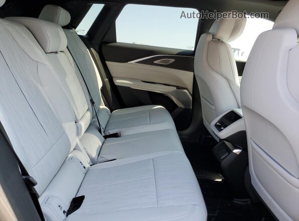 1GYKPRRLXRZ111549 2024 CADILLAC OTHER Зеленый Вид задней части салона