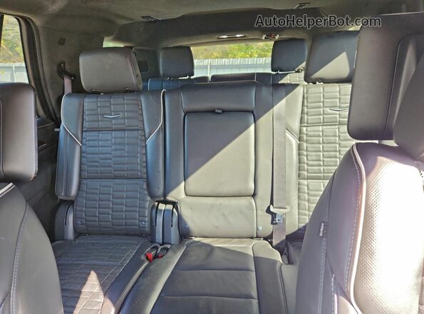 1GYS4GKL3PR311869 2023 CADILLAC ESCALADE Red Rear seats view