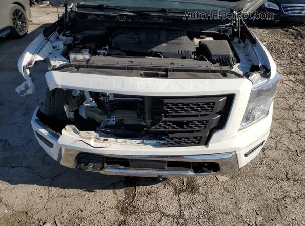1N6AA1EC3MN529913 2021 NISSAN TITAN White Vista interior trasera