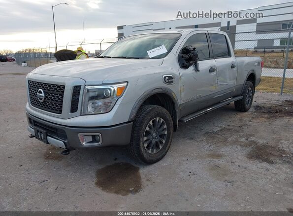 1N6BA1F40KN511684 2019 NISSAN TITAN XD Silver Առջևի ձախ երեք քառորդ տեսարան
