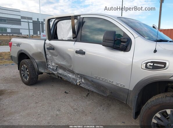 1N6BA1F40KN511684 2019 NISSAN TITAN XD Silver Դիմացի տեսք