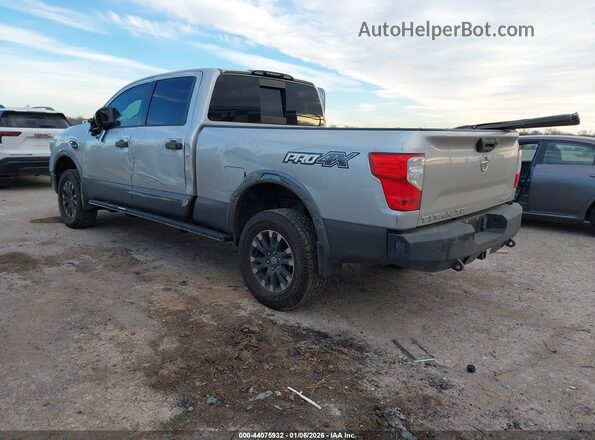 1N6BA1F40KN511684 2019 NISSAN TITAN XD Silver Հետևի ձախ
