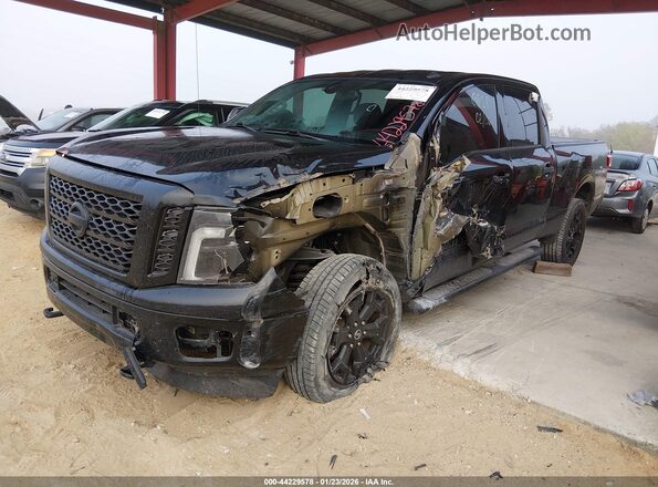 1N6BA1F49KN516592 2019 NISSAN TITAN XD Black Առջևի ձախ երեք քառորդ տեսարան