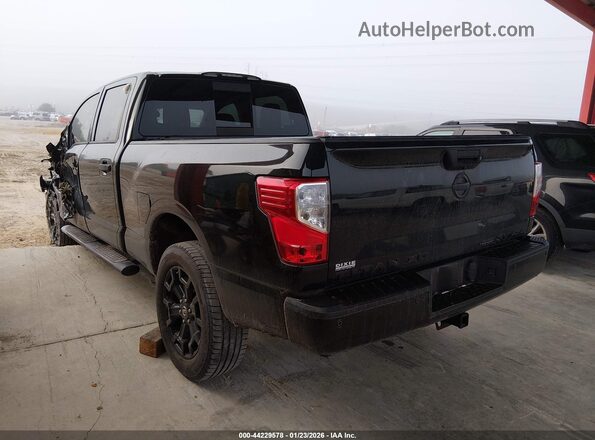 1N6BA1F49KN516592 2019 NISSAN TITAN XD Black Հետևի ձախ