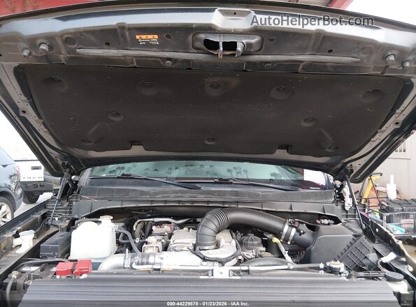 1N6BA1F49KN516592 2019 NISSAN TITAN XD Black Հետևի տեսք