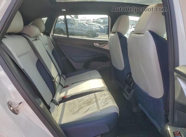 1V25MPE88RC006074 2024 VOLKSWAGEN ID.4 Белый Вид задней части салона