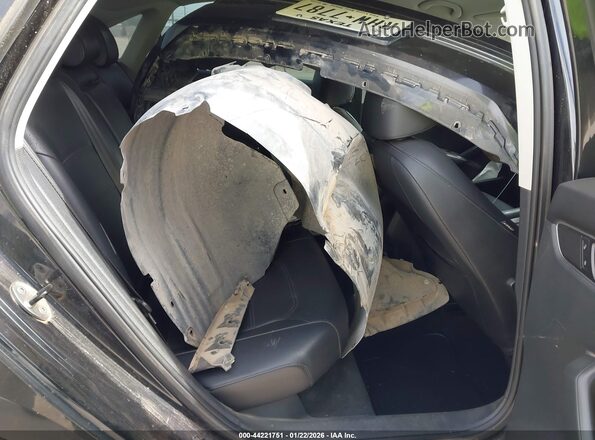1VWDT7A31HC028634 2017 VOLKSWAGEN PASSAT Black Widok naklejki z numerem VIN
