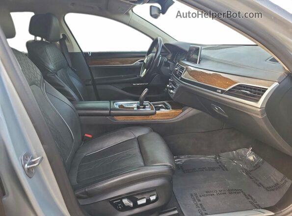 WBA7F0C56JGM23966 2018 BMW 7 SERIES Silver Rear view