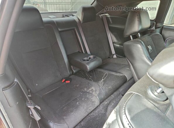 2C3CDZFJXNH245871 2022 DODGE CHALLENGER Purple Vista de los asientos traseros