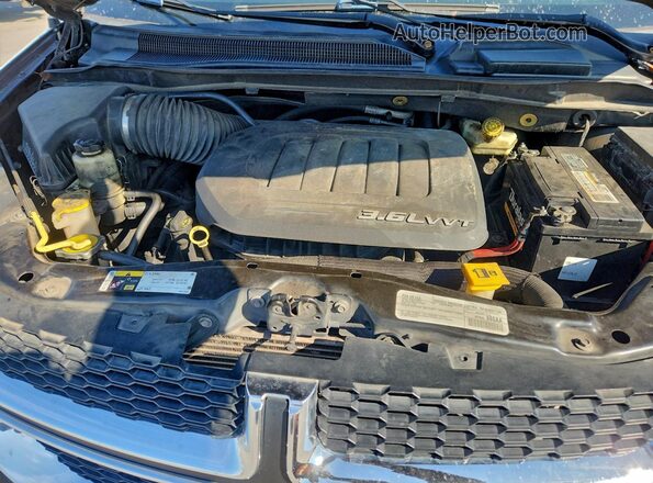 2C4RDGCG2HR715165 2017 DODGE CARAVAN Black Widok naklejki z numerem VIN