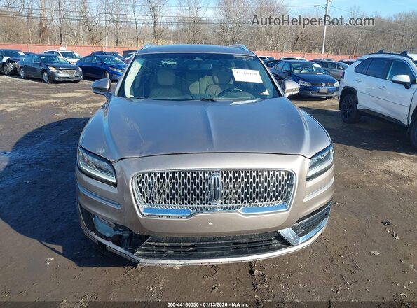2LMPJ6J90LBL35144 2020 LINCOLN NAUTILUS Tan Widok zestawu wskaźników