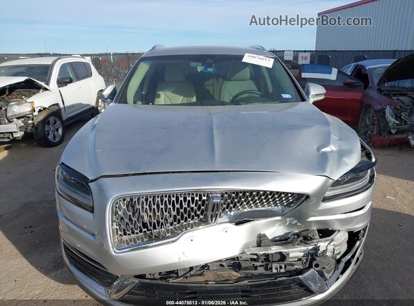 2LMPJ6K94KBL32261 2019 LINCOLN NAUTILUS Серебряный Вид щитка приборов