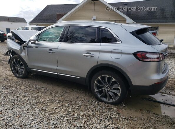 2LMPJ8K95PBL13592 2023 LINCOLN NAUTILUS Silver Trasero izquierdo