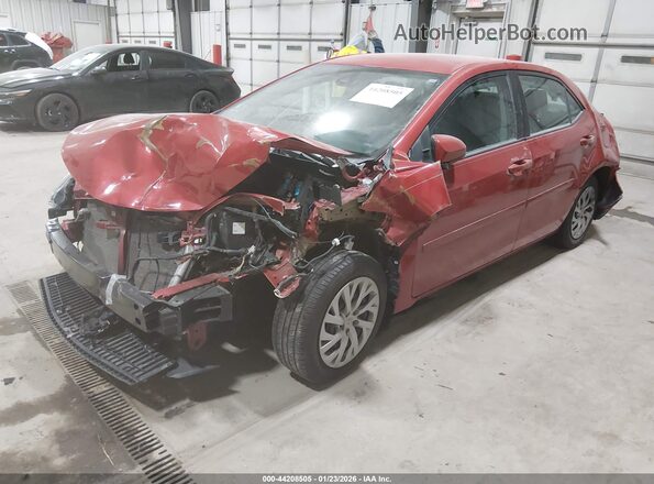 2T1BURHE3HC958052 2017 TOYOTA LL Red წინა მარცხენა ხედი სამი მეოთხედიდან