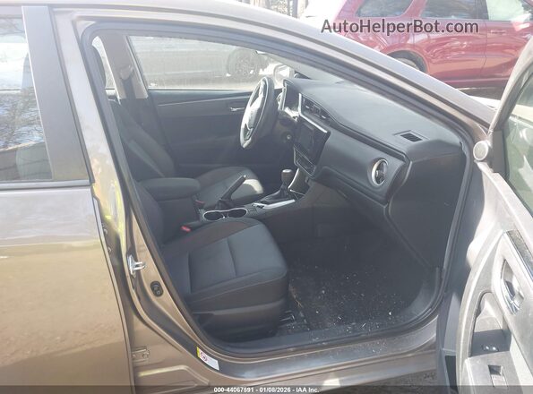 2T1BURHE3JC114051 2018 TOYOTA LL Gray Vista interior delantera