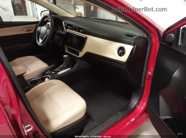 2T1BURHE6JC020083 2018 TOYOTA LL Red Vista interior delantera