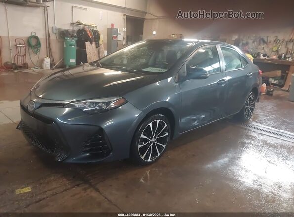 2T1BURHE8JC972857 2018 TOYOTA LL Gray Front left