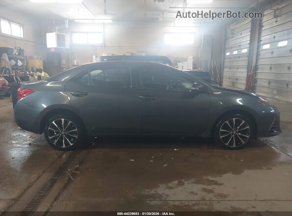 2T1BURHE8JC972857 2018 TOYOTA LL Gray Rear interior view