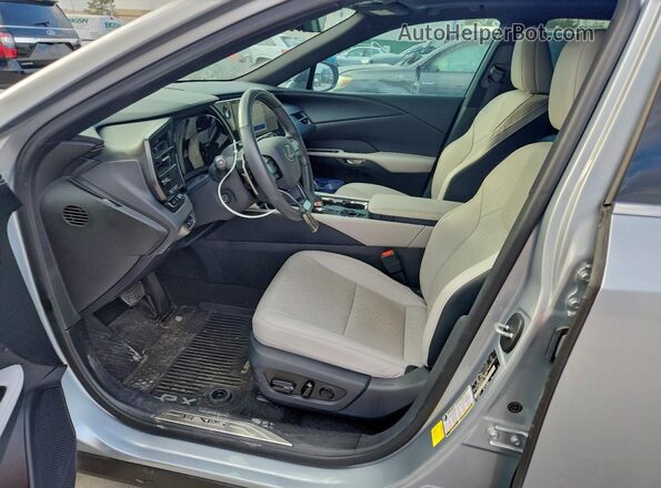2T2BAMBA7PC009731 2023 LEXUS RX Silver Front interior view