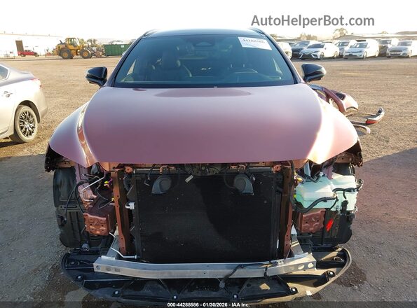 2T2BCMEA0RC013404 2024 LEXUS RX 500H Orange Widok wnętrza z tyłu