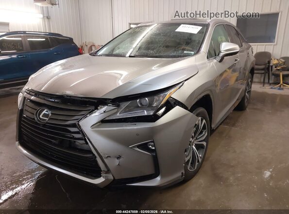 2T2BZMCA5JC161831 2018 LEXUS RX 350 Серебряный Передняя левая четверть