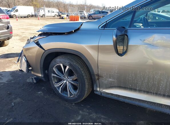 2T2BZMCA6KC191079 2019 LEXUS RX 350 Silver Вид спереду