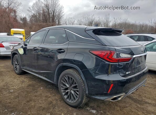 2T2BZMCA9GC022715 2016 LEXUS RX Black Trasero izquierdo