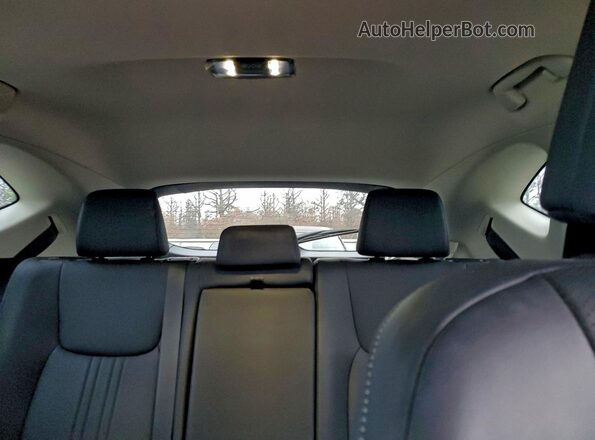2T2GDCAZ4PC004016 2023 LEXUS NX Charcoal Rear seats view
