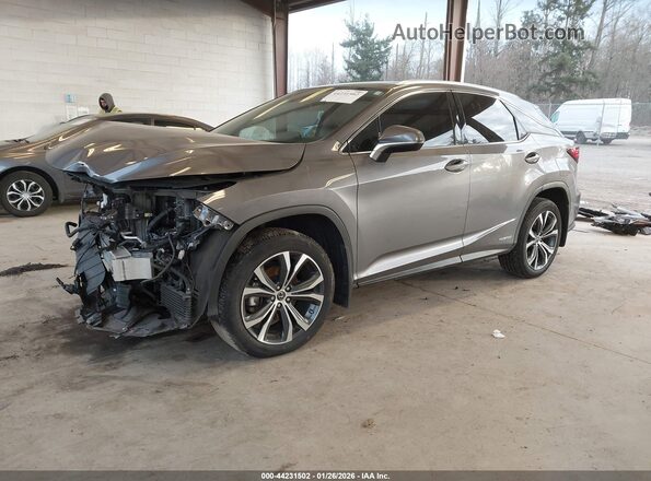 2T2HGMDA7MC059398 2021 LEXUS RX 450H Gray Vista tres cuartos delantera izquierda