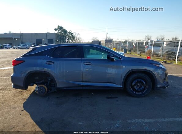 2T2SGMDAXLC046603 2020 LEXUS RX 450H Gray Widok wnętrza z tyłu