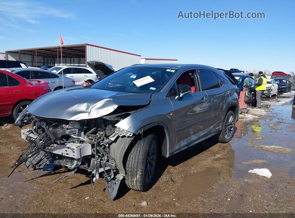 2T2SGMDAXMC068134 2021 LEXUS RX 450H Silver Vista tres cuartos delantera izquierda
