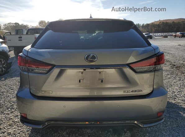 2T2YGMDAXMC062800 2021 LEXUS RX Silver 