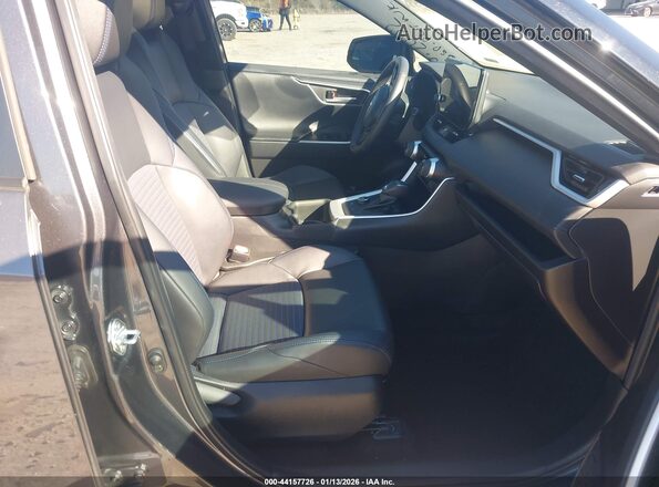 2T3E6RFV0PW042072 2023 TOYOTA RAV4 HYBRID Gray Vista interior delantera
