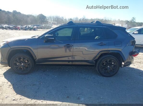 2T3E6RFV0PW042072 2023 TOYOTA RAV4 HYBRID Gray Vista interior trasera