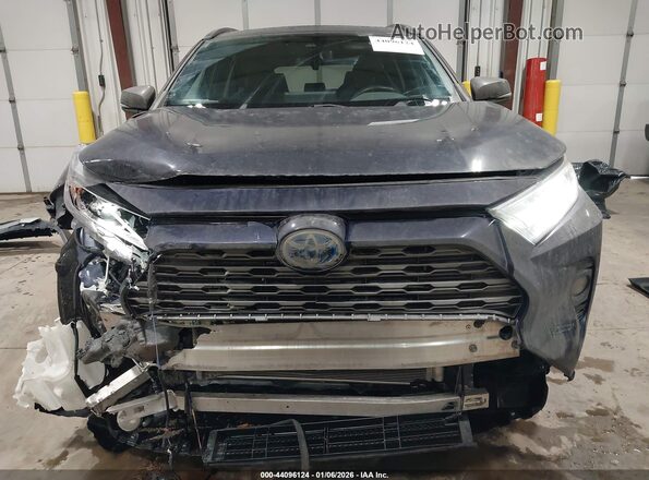 2T3EWRFVXKW016569 2019 TOYOTA RAV4 HYBRID Blue Вид задньої частини салону